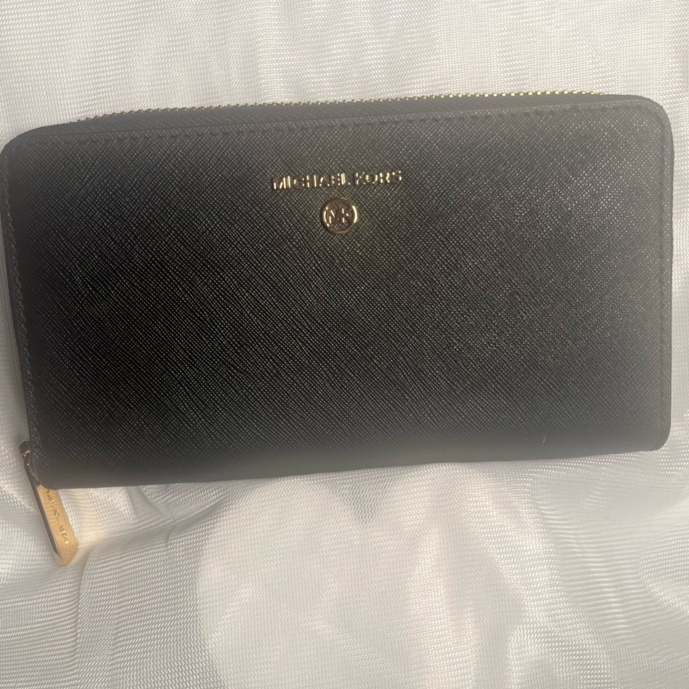 Michael Kors long black wallet, never used. Black